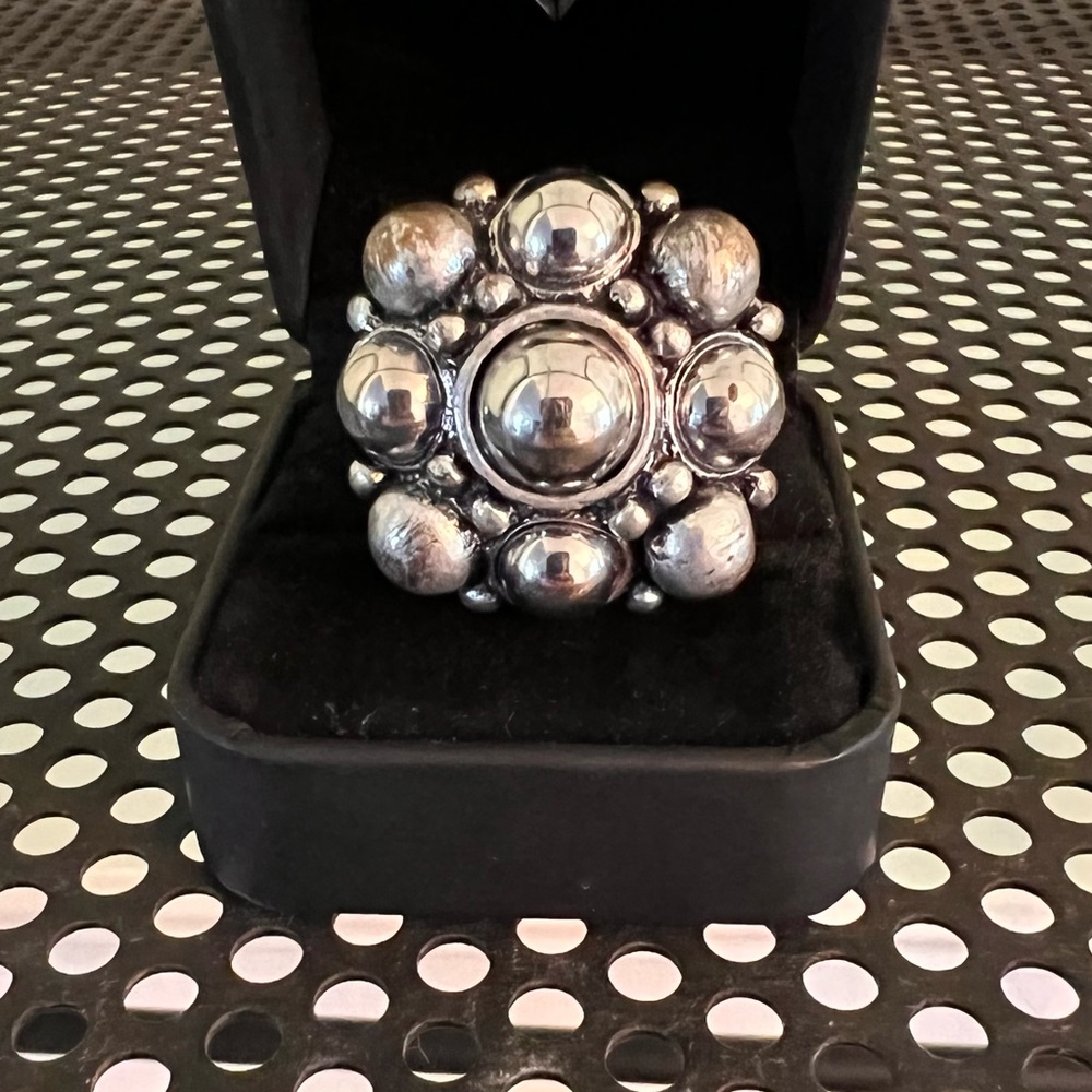 Chunky vintage-look silver ring with square and globe shapes and stretchy band
